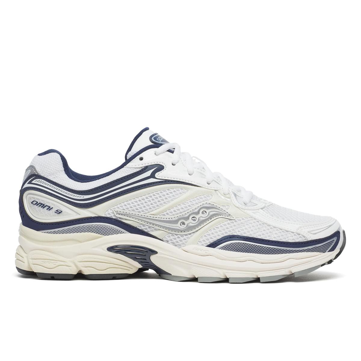 Saucony ProGrid Omni 9 blanche et navy en mesh respirant avec amorti ProGrid et design rétro technique élégant. vue de profil