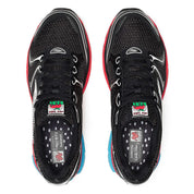 Saucony ProGrid Triumph 4 Keith Haring NYC Marathon en mesh blanc cassé avec motifs graphiques iconiques et amorti ProGrid.