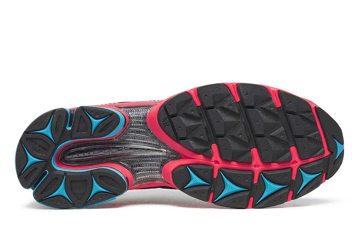 Saucony ProGrid Triumph 4 Keith Haring NYC Marathon en mesh blanc cassé avec motifs graphiques iconiques et amorti ProGrid.