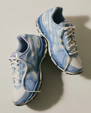 Sneakers ASICS Gel-Kayano 12.1 Kith Voyage en mesh technique crème avec amorti GEL® et détails Kith premium.Vue de haut 