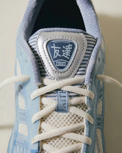 Sneakers ASICS Gel-Kayano 12.1 Kith Voyage en mesh technique crème avec amorti GEL® et détails Kith premium.Vue zoomer de face