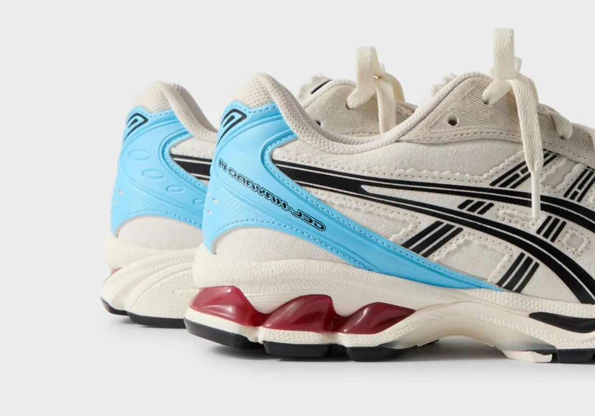 Sneakers ASICS Gel-Kayano 14 Kith Marvel vs. Capcom Ryu en Coconut Milk/Black en mesh technique avec amorti GEL™ et branding gaming premium.Vue zoomer coté arrière 