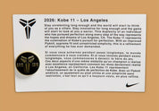 Sneaker Nike Kobe 11 Elite Low Protro noire avec détails dorés en Flyknit et semelle performance React et Air Zoom iconique