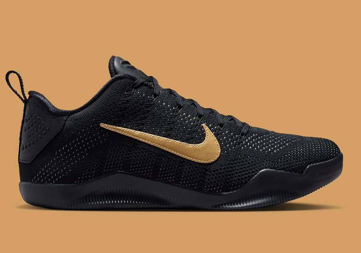 Sneaker Nike Kobe 11 Elite Low Protro noire avec détails dorés en Flyknit et semelle performance React et Air Zoom iconique