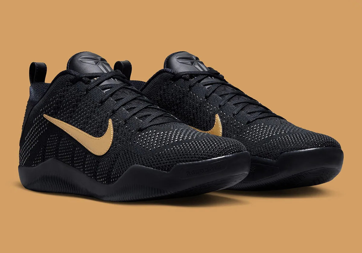 Sneaker Nike Kobe 11 Elite Low Protro noire avec détails dorés en Flyknit et semelle performance React et Air Zoom iconique