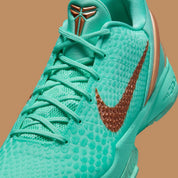 Nike Kobe 6 Protro verte Statue of Liberty avec texture scales, détails cuivrés et amorti Protro.