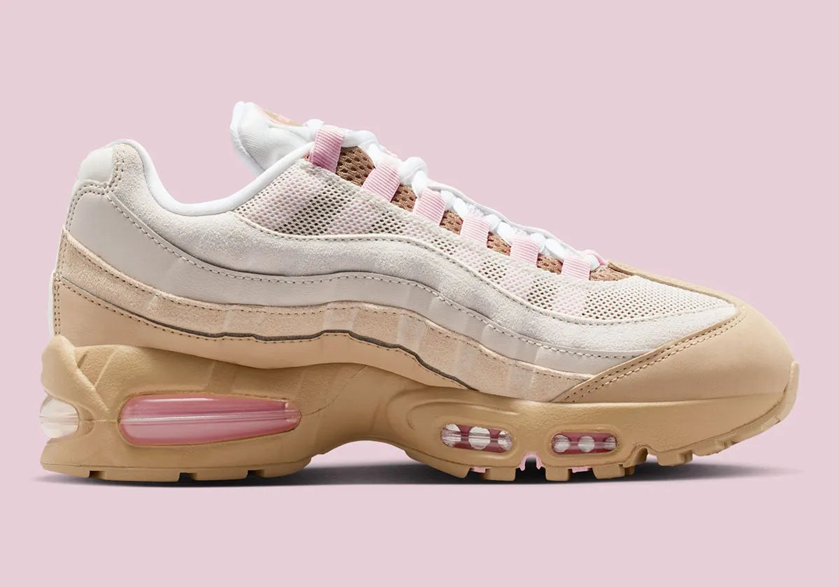 Sneakers Nike Air Max 95 OG Big Bubble Linen en mesh et suède beige avec unités Air visibles surdimensionnées et design ondulé iconique.Vue de coté intérieur 