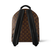 Louis Vuitton Palm Springs Monogram MM, sac à dos en toile Monogram marron avec garnitures en cuir, poche avant zippée et bretelles ajustables.