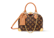 Louis Vuitton Alma Trunk BB, sac en toile Monogram marron avec cuir noir, coins métalliques dorés, cadenas et chaîne amovible.