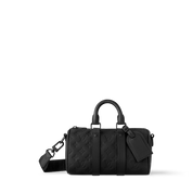 Louis Vuitton Keepall Bandoulière 25 Monogram Embossed Black en cuir de veau grainé embossé Monogram noir avec poignées roulées, bandoulière amovible, fermeture zippée et finitions métalliques.
