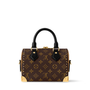 Louis Vuitton Speedy Trunk 20, sac en toile Monogram Ébène avec poignées en cuir lisse, chaîne dorée, cadenas et bandoulière ajustable.