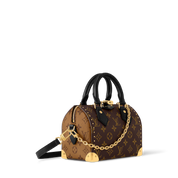 Louis Vuitton Speedy Trunk 20, sac en toile Monogram Ébène avec poignées en cuir lisse, chaîne dorée, cadenas et bandoulière ajustable.