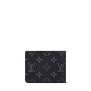 Louis Vuitton Slender Wallet Monogram Eclipse, portefeuille compact noir et gris en toile Monogram avec huit emplacements pour cartes.