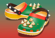 Crocs Classic Platform Clog Super Mario Bros. Bowser verte avec pics moulés sur l'empeigne, plateforme jaune, col rouge, bride noire à rivets blancs et construction en Croslite™.