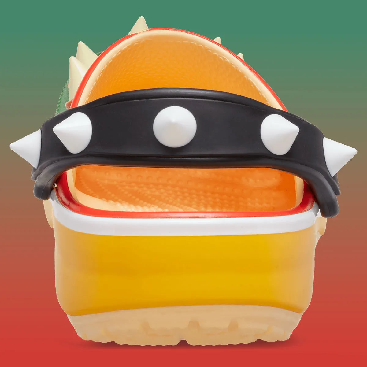 Crocs Classic Platform Clog Super Mario Bros. Bowser verte avec pics moulés sur l'empeigne, plateforme jaune, col rouge, bride noire à rivets blancs et construction en Croslite™.