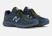 New Balance 990v4 MiUSA Navy Meteorite Kombu U990BG4 en mesh et suède bleu marine, gris Meteorite et vert Kombu avec semelle ENCAP vue de 3/4 face. 