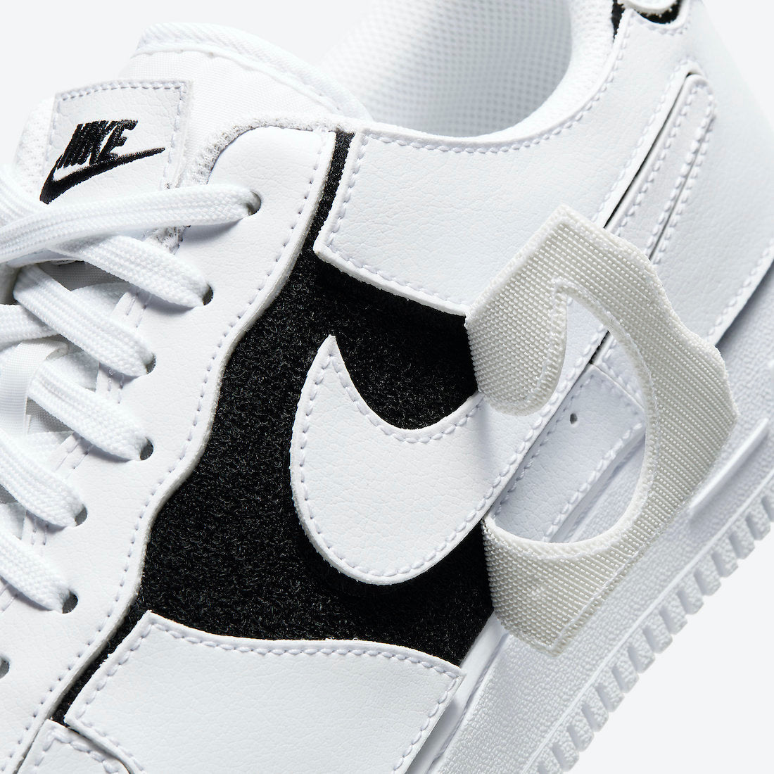 Nike Air Force 1/1 Cosmic Clay, sneaker blanche en cuir avec panneaux amovibles noirs et rouges Cosmic Clay et semelle Nike Air.