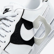 Nike Air Force 1/1 Cosmic Clay, sneaker blanche en cuir avec panneaux amovibles noirs et rouges Cosmic Clay et semelle Nike Air.