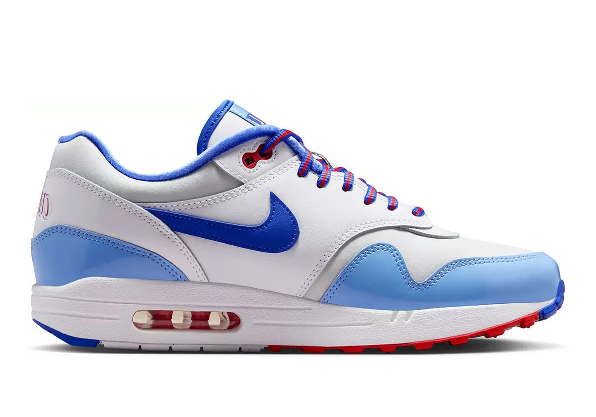 Nike Air Max 1 Atlanta Braves City Connect 2026 en mesh navy et rouge avec semelle Air visible et détails baseball exclusifs. vue de profil intérieur