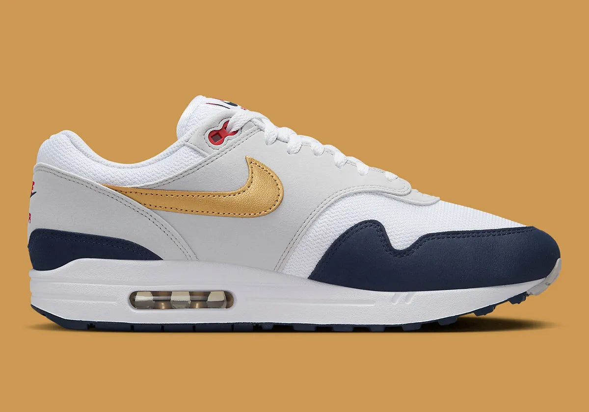  Chaussure de rue Nike Air Max 1 Olympic bleu , blanc , dorée , gris , semelle confortable , vu de profil