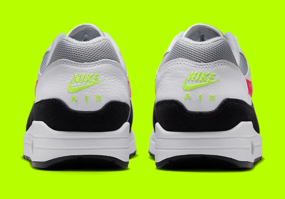 Nike Air Max 1 Chili Volt, sneaker Nike Air Max 1 avec coloris Chili et Volt, amorti Nike Air visible et finitions premium.