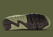 Sneakers Nike Air Max 90 Premium Skunk vert foncé en matières premium texturées avec unité Air visible et design iconique