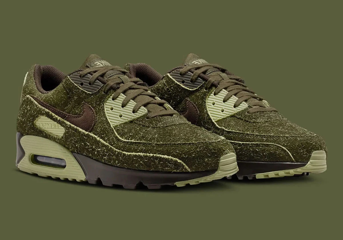 Sneakers Nike Air Max 90 Premium Skunk vert foncé en matières premium texturées avec unité Air visible et design iconique
