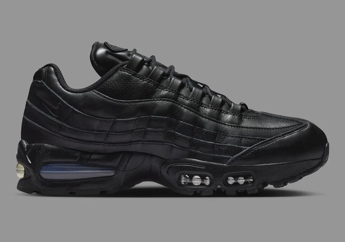 Sneakers Nike Air Max 95 QS noires en cuir premium avec unité Air Max Big Bubble visible et design iconique
