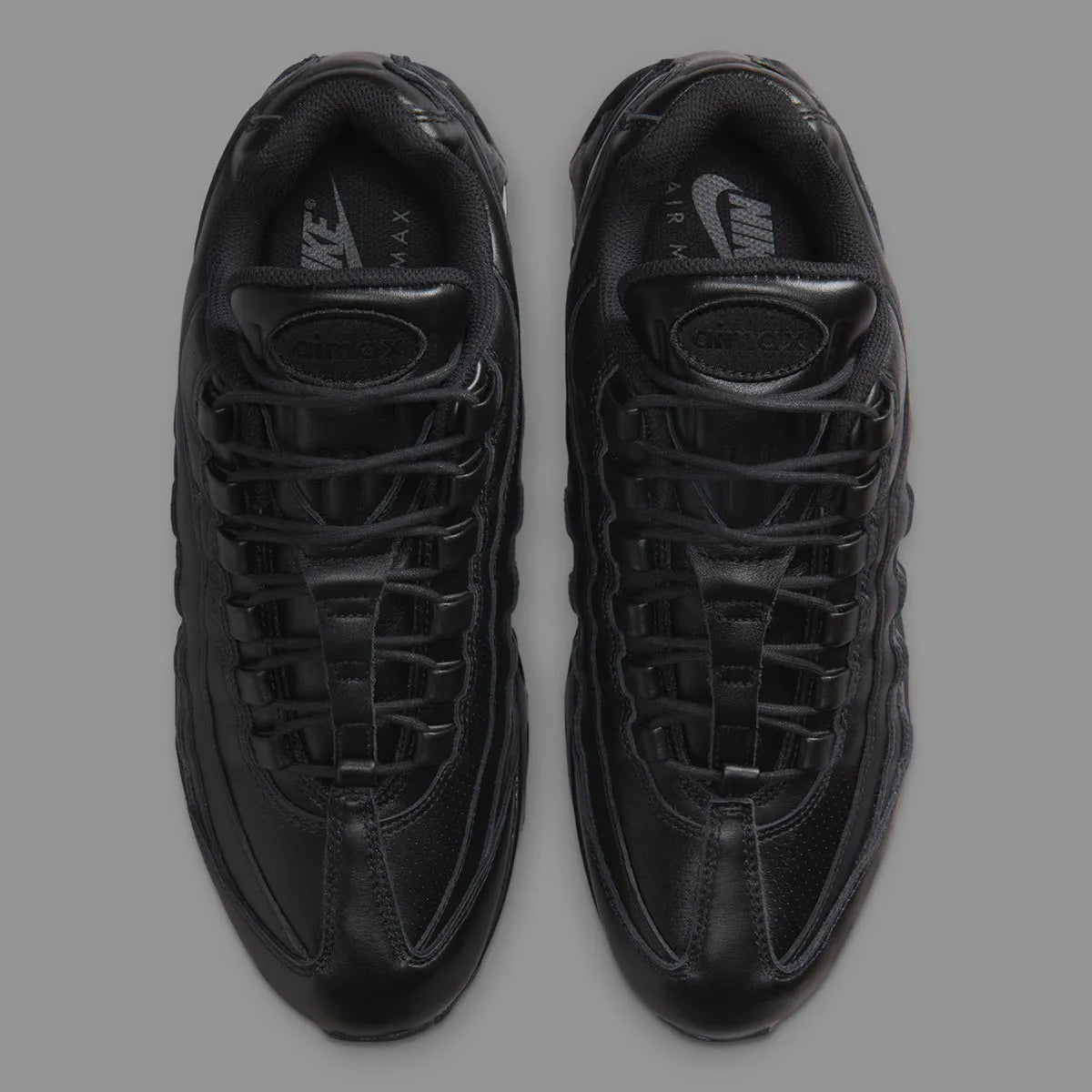 Sneakers Nike Air Max 95 QS noires en cuir premium avec unité Air Max Big Bubble visible et design iconique