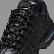 Sneakers Nike Air Max 95 QS noires en cuir premium avec unité Air Max Big Bubble visible et design iconique