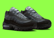 Nike Air Max 95 OG Big Bubble Black Lime Blast Anthracite, sneaker noire et anthracite avec détails vert Lime Blast et unités Max Air visibles.