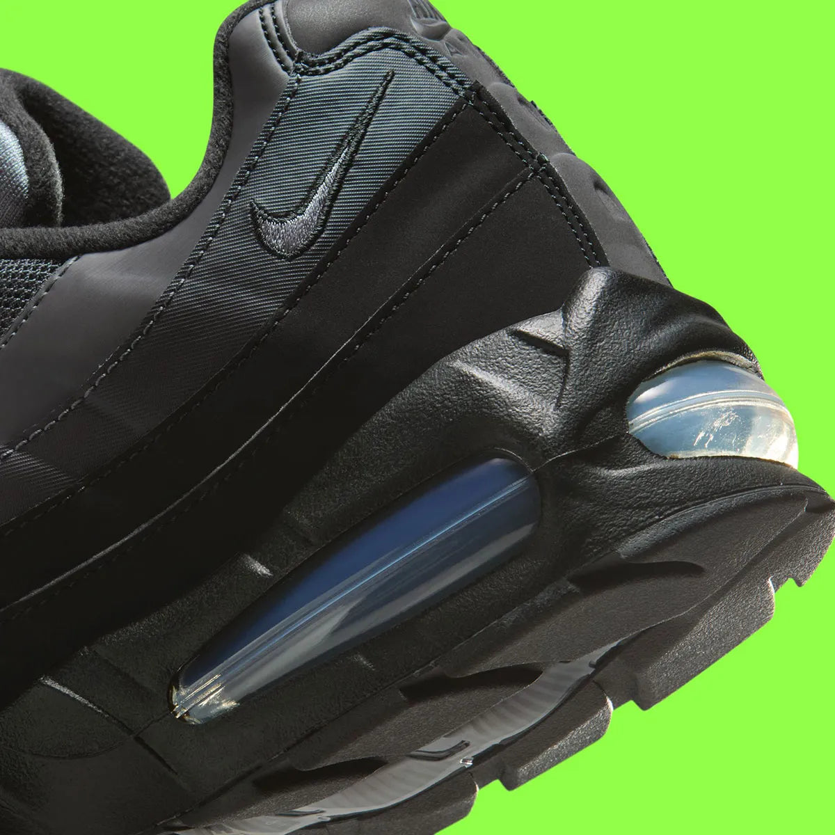 Nike Air Max 95 OG Big Bubble Black Lime Blast Anthracite, sneaker noire et anthracite avec détails vert Lime Blast et unités Max Air visibles.