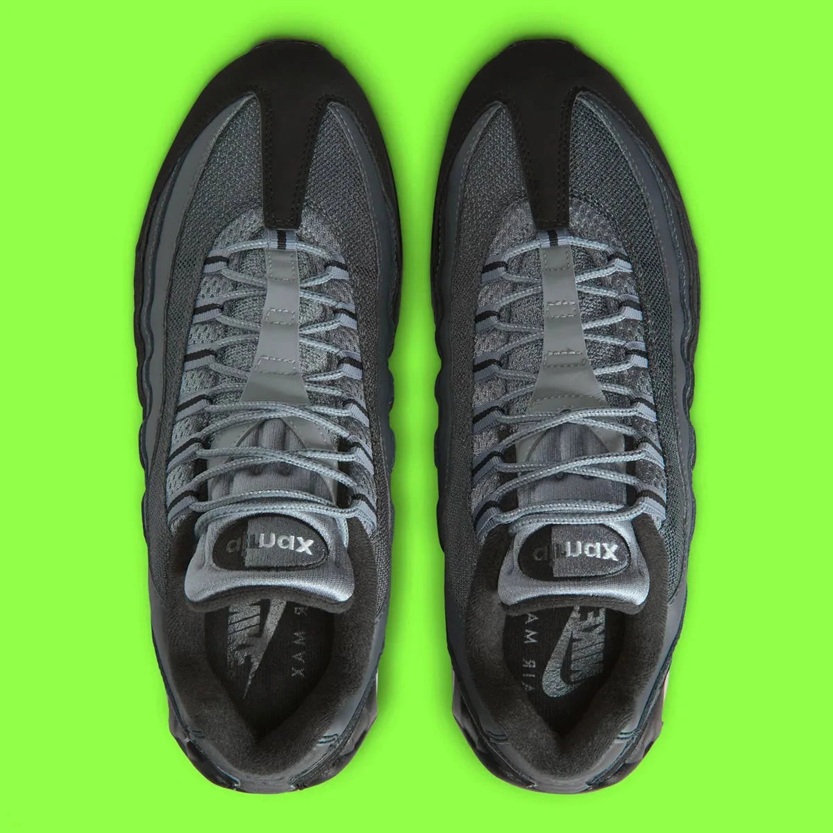 Nike Air Max 95 OG Big Bubble Black Lime Blast Anthracite, sneaker noire et anthracite avec détails vert Lime Blast et unités Max Air visibles.