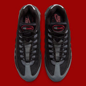 Nike Air Max 95 Smoke Grey DH9792-100, sneaker grise et blanche avec détails rouges, motifs japonais et unités Nike Air visibles.