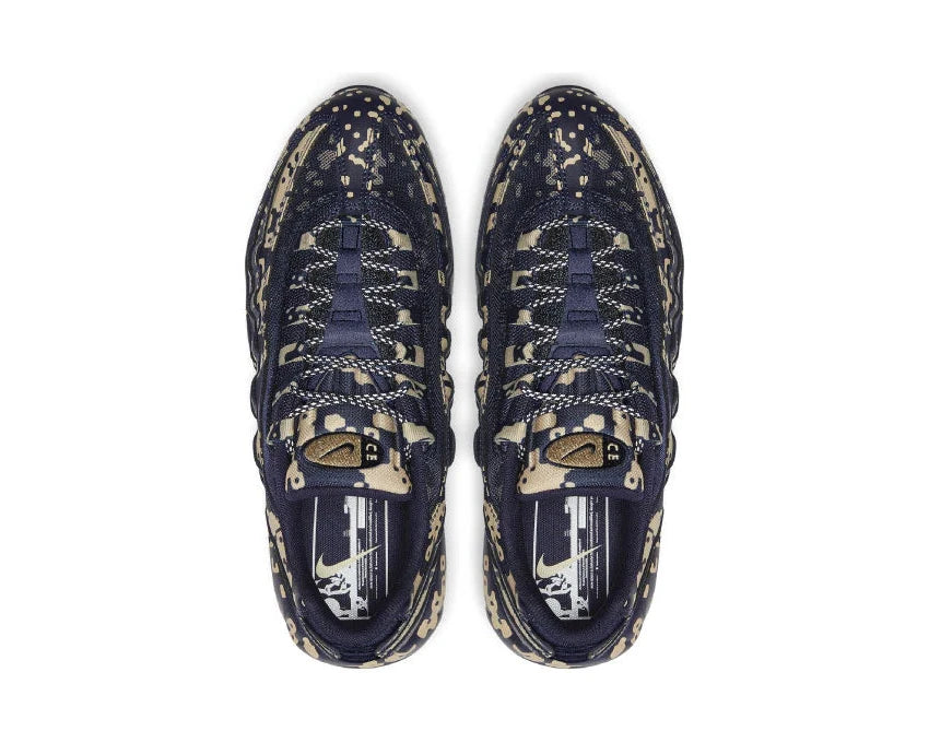 Sneakers Nike Air Max 95 Cavaliers Empt Blackened Blue en mesh technique sombre avec unités Air visibles et design ondulé iconique.Vue de haut 