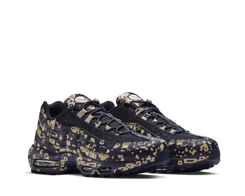 Sneakers Nike Air Max 95 Cavaliers Empt Blackened Blue en mesh technique sombre avec unités Air visibles et design ondulé iconique.Vue de profil