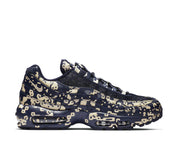 Sneakers Nike Air Max 95 Cavaliers Empt Blackened Blue en mesh technique sombre avec unités Air visibles et design ondulé iconique.Vue de coté 