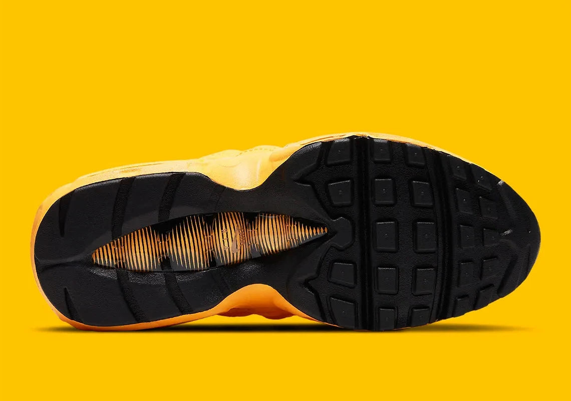 Sneakers Nike Air Max 95 NYC Taxi jaunes et noires en mesh et matières synthétiques avec amorti Air Max visible. Vue du dessous 