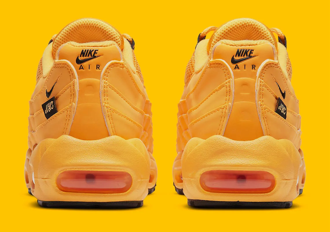Sneakers Nike Air Max 95 NYC Taxi jaunes et noires en mesh et matières synthétiques avec amorti Air Max visible. Vue de derrière 