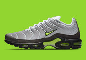 Nike Air Max Plus Neon grise et noire avec mesh dégradé, détails Neon Yellow fluorescents et unités Tuned Air visibles.