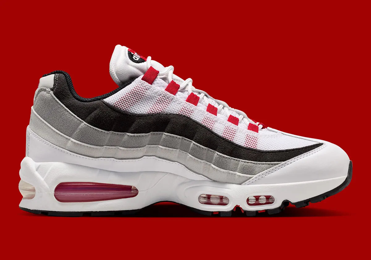 Nike Air Max 95 Comet Red IB7862-100, sneaker blanche et grise avec détails rouge Comet, panneaux ondulés et unité Max Air Big Bubble.