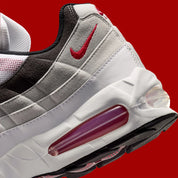Nike Air Max 95 Comet Red IB7862-100, sneaker blanche et grise avec détails rouge Comet, panneaux ondulés et unité Max Air Big Bubble.