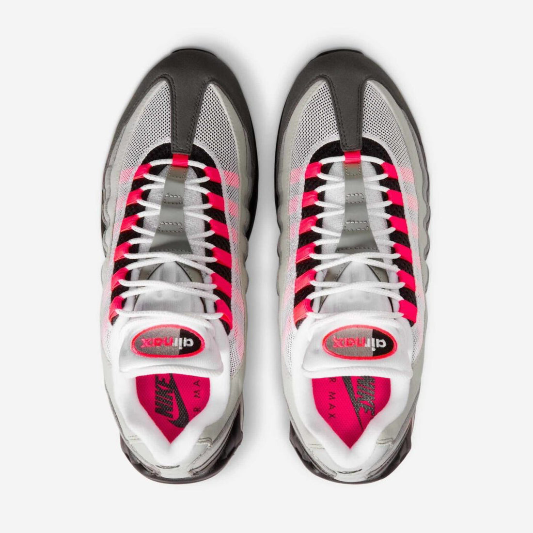 Nike Air Max 95 OG Big Bubble Reverse Solar Red avec tige en mesh, cuir synthétique et suède en dégradé de gris, accents Solar Red, unités Big Bubble Air visibles et semelle extérieure en caoutchouc vue du dessus. 