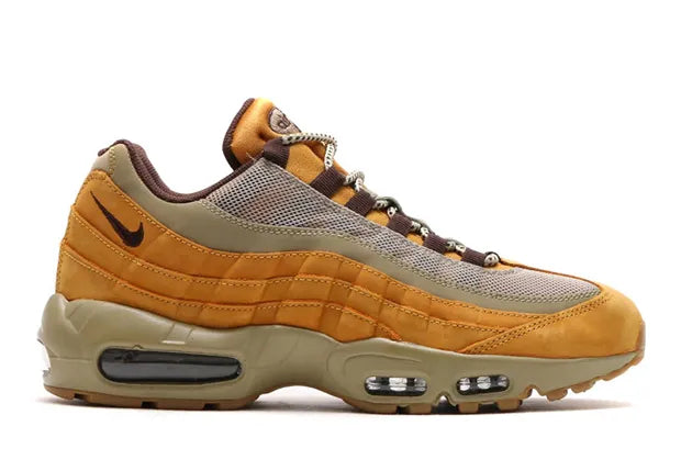 Nike Air Max 95 Wheat marron et beige avec panneaux multicouches Bronze, Baroque Brown et Bamboo et unités Air visibles.
