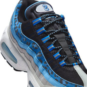 Sneakers Nike Air Max 95 Yardrunners Spellman en mesh et textiles premium avec unités Air visibles et design ondulé iconique.Vue zoomer coté 