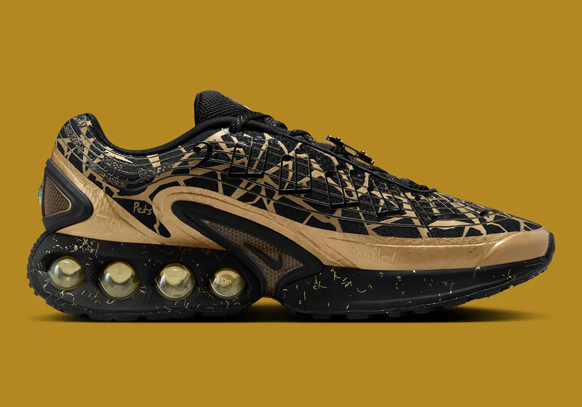 Sneakers Nike Air Max Dn Doernbecher Connor en matériaux techniques premium avec design expressif et semelle Dynamic Air innovante vue de profil intérieur. 