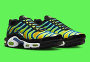 Nike Air Max Plus Heat Map, sneaker TN jaune, verte et bleue avec effet thermique, renforts noirs et unités Air visibles.