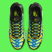 Nike Air Max Plus Heat Map, sneaker TN jaune, verte et bleue avec effet thermique, renforts noirs et unités Air visibles.