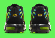 Nike Air Max Plus Heat Map, sneaker TN jaune, verte et bleue avec effet thermique, renforts noirs et unités Air visibles.
