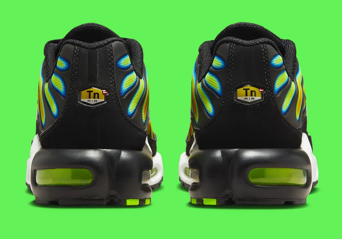 Nike Air Max Plus Heat Map, sneaker TN jaune, verte et bleue avec effet thermique, renforts noirs et unités Air visibles.